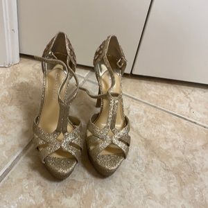 Gold high heels, worn once.